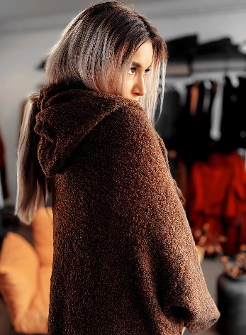 iLo wearing a brown teddy coat